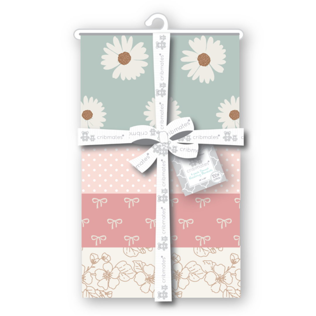 Set of baby blankets with floral and polka dot patterns on a white background
