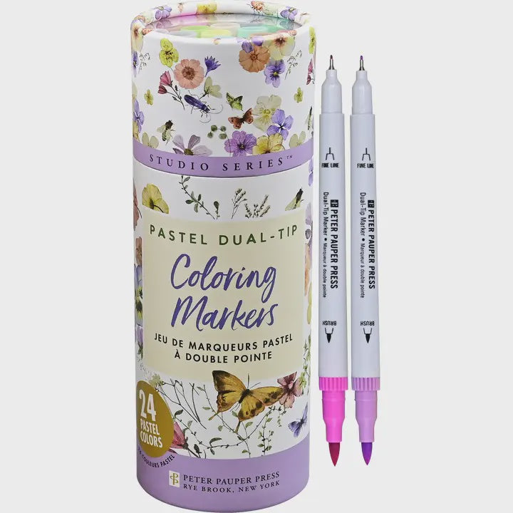 Pastel dual-tip coloring markers with packaging on a white background