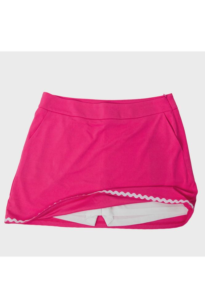 Pink skirt with white trim on a light gray background