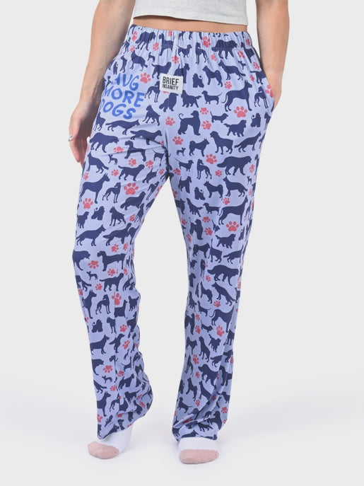 Patterned pajama pants with dog design and text on a white background